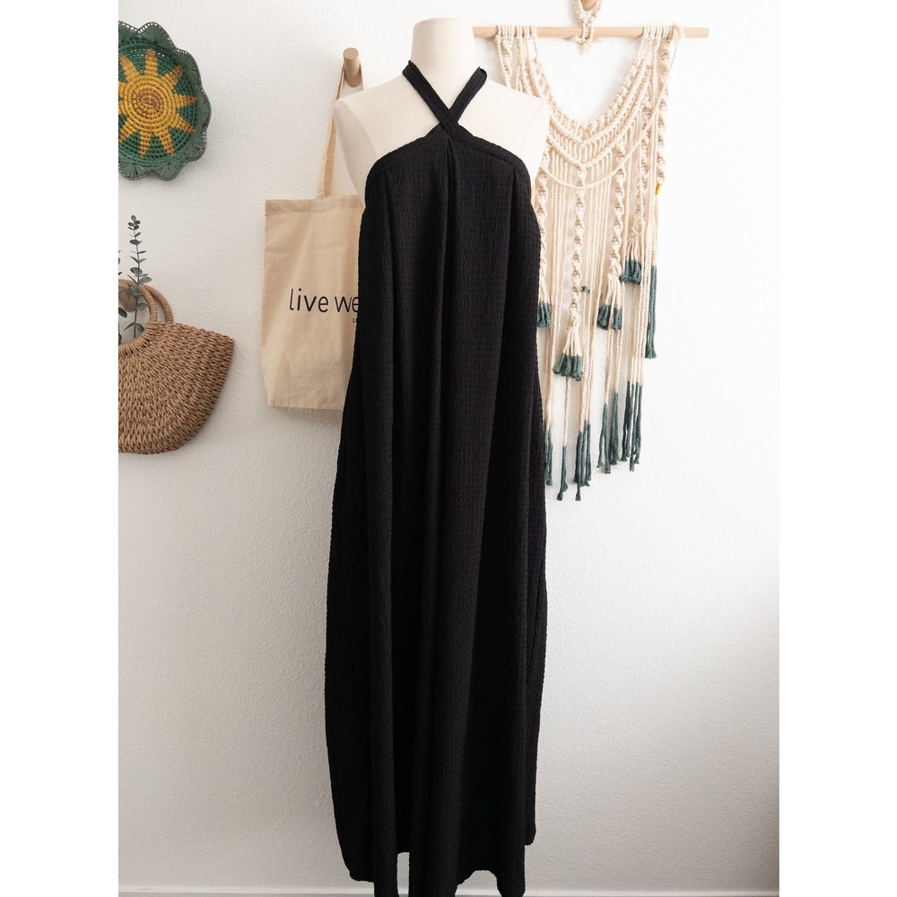 Asos DESIGN Cross Neck Textured Swing Bib Jumpsuit in Black